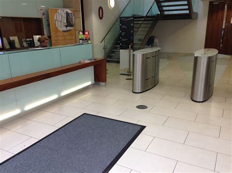 Wet slippery porcelain tiles made safe in City Council Building