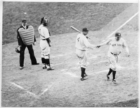 New York Yankee Babe Ruth Shaking Hands With Teammate Lou Gehrig After Crossing Home Plate After