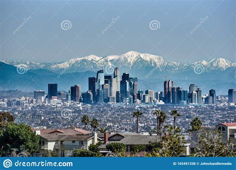 Downtown Los Angeles With Snowy Mountains Editorial Stock