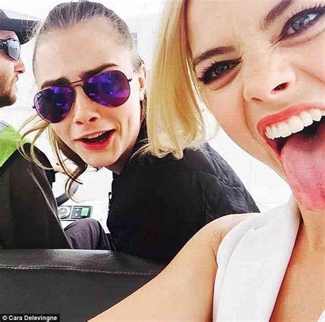 Margot Robbie And Cara Delevingne Light Up The Comic Con Stage For Suicide Squad Daily Mail Online