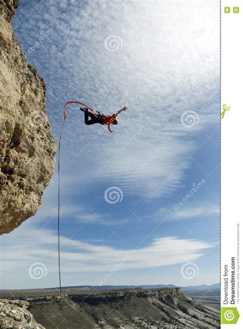 Jump Off The Cliff Stock Photo Image Of Freefall People 74371374