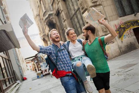 Young Travelling People Having Fun In City Stock Photo Image Of