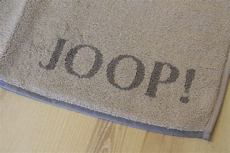 Die objekte liegen in der waschtemperatur und der schleuderzahl. JOOP! Badtematte 1600 Doubleface Sand Graphit | Teppich ...