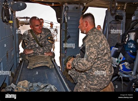 Leaning On A Litter Pan Of A Uh 60 Black Hawk Medevac Helicopter Maj