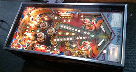 This is a pinball table that is made from wood. Pinball Coffee Tables | Pinball, Coffee table vintage, Diy ...