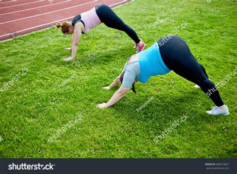 Two Young Active Fat Women Bending Stock Photo Edit Now 686619667