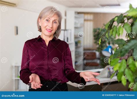 Mature Woman Meeting Visitors At Office Stock Image Image Of