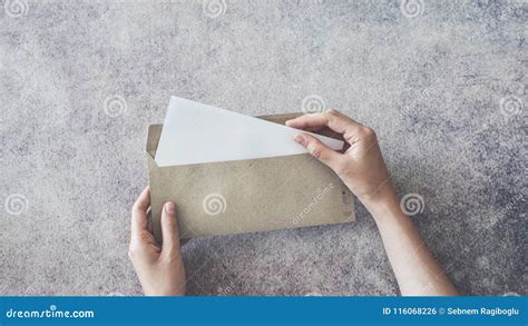 Top View Of Female Hands Opening Envelope Stock Photo Image Of