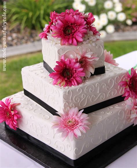 Square Wedding Cake With Pink Daisies And Black Ribbon Square Wedding