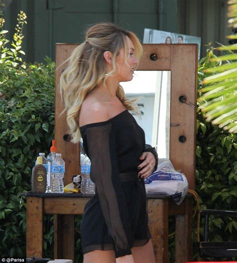 Candice Swanepoel Shows Off Lithe Pins In Sheer Black Playsuit While