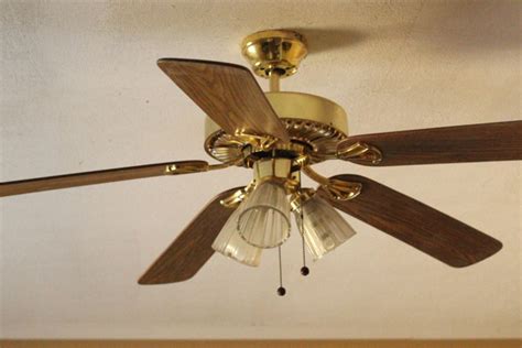 A ceiling fan gets a rustic look reminiscent of old metal as diynetwork.com experts add a coat of clear primer is sprayed over the fan blades (make sure to wear a face mask for this step). Elsa's Baby Talk: Spray Painted Ceiling Fan