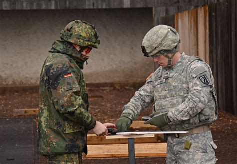 German And American Soldiers Participate In Weapons Qualification Range