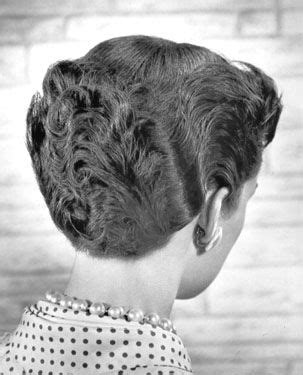 The bangs are then nurtured into that classic ducktail swirl. The Italian Boy Look | Tail hairstyle, Vintage hairstyles, Womens haircuts