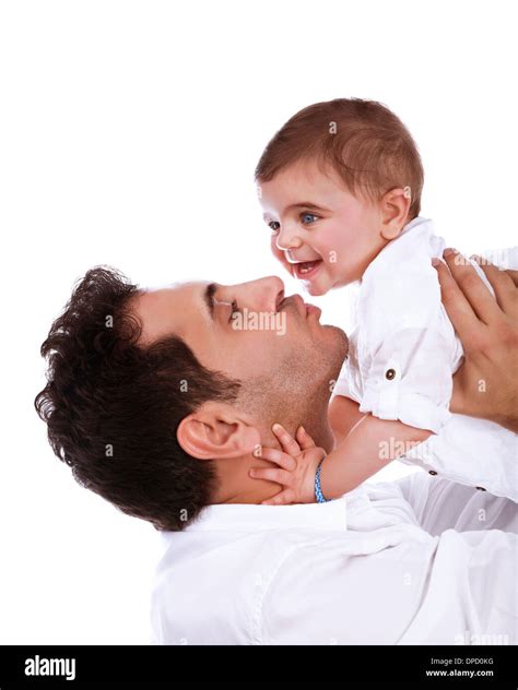 Happy Father Kissing Baby Daughter Isolated On White Background