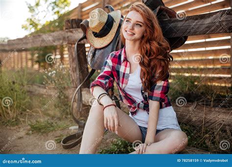Cheerful Young Woman Cowgirl Sitting And Smiling Outdoors Stock Image Image Of Farmer Beauty
