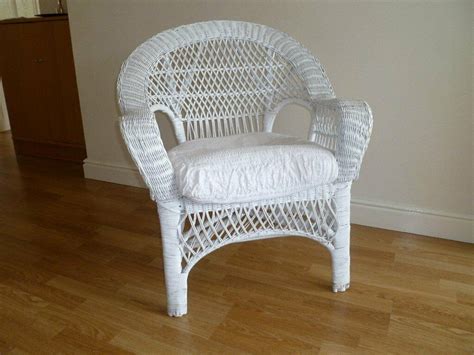 If you want a bedroom chair, but don't have the space, a hanging pod chair may be the perfect solution. White wicker chair with bespoke cushion suitable for ...