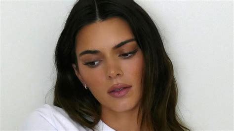 kendall jenner flashes her bare butt in tiny calvin klein underwear as she rolls around in bed