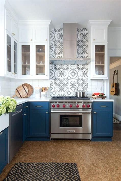 I love how you hardly notice the uppers yet you still have all that storage! kitchens with blue lower cabinets and white uppers - Google Search | New kitchen cabinets ...