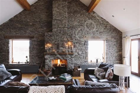 House With Stone Wall Feature In The Living Room Interior