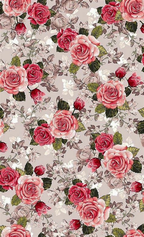 A Floral Pattern With Red Roses And Green Leaves On A Gray Background