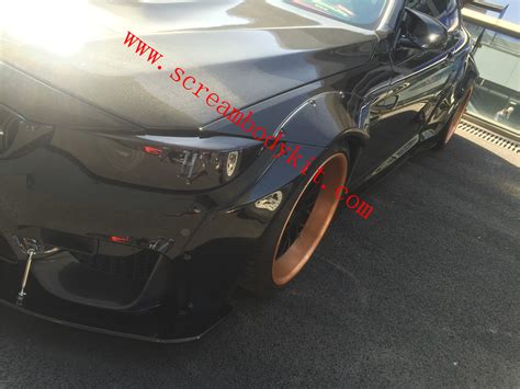 Carbon fiber rear diffuser by autotecknic®. BMW M4 wide body kit front lip after lip spoiler fenders