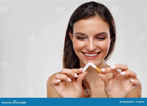 Stop Smoking Beautiful Woman Breaking Cigarette In Half Stock Image Image Of Cigarettes