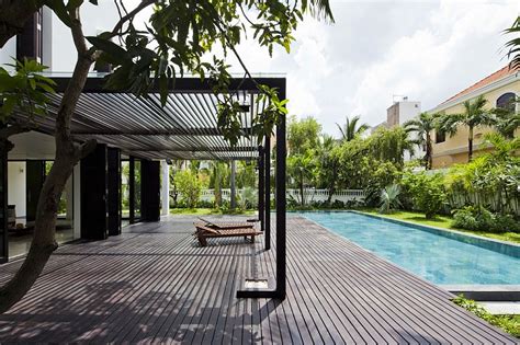 Many pool house plans have more to offer than just a changing room and restroom for swimmers. Lavish Private Villa in Vietnam Wrapped in a Wall of Green!