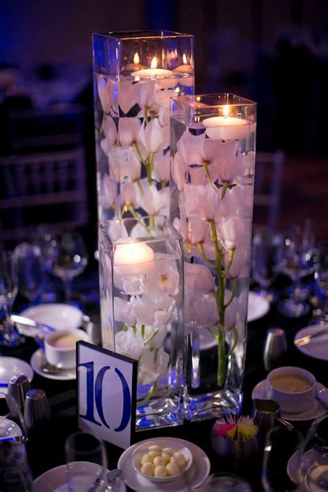 Vegetable waxes harden and complete crystallization at different points in time, often producing a much different burn and throw than when freshly made. 37 Floating Flowers And Candles Centerpieces - Shelterness