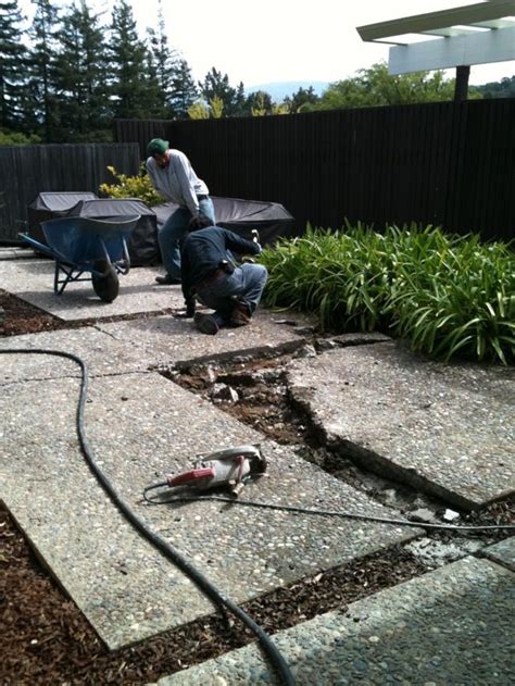 I decided to spruce up my concrete patio by spray painting a stone design on it. Broken to Beautiful - Salvaging a Cracked Concrete Patio ...