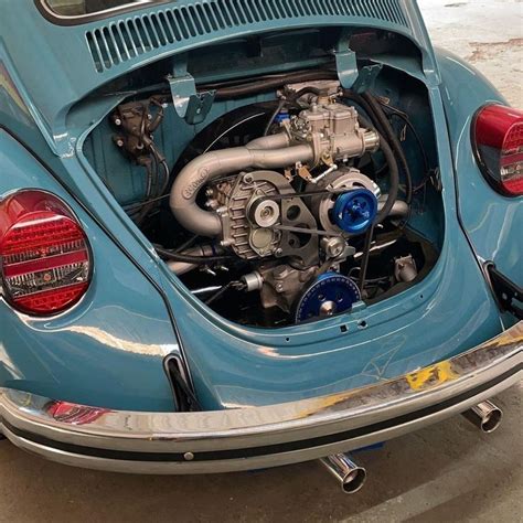 The Engine Compartment Of An Old Volkswagen Beetle