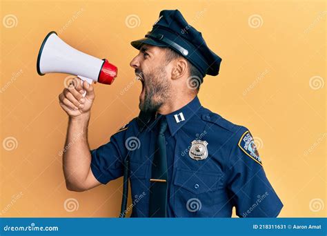 American Police Officer Shouting Through Megaphone Yelling And