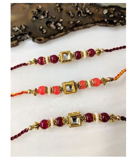 Kundan Rakhi Set For Men Traditional Stone Red And Orange Beads