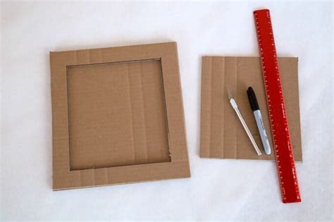 This beadboard frame is designed to not only look cute, but to be functional and versatile as well. DIY Cardboard Frame with Kids Art as a Handmade Gift Idea