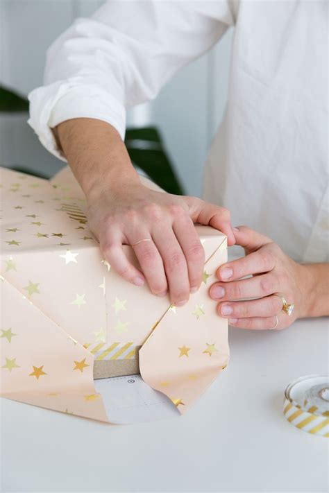 Your Step By Step Guide To Perfectly Wrapping Any Present T
