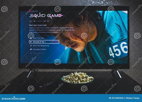 Watching Squid Game Show On TV. Squid Game Is A South Korean Survival