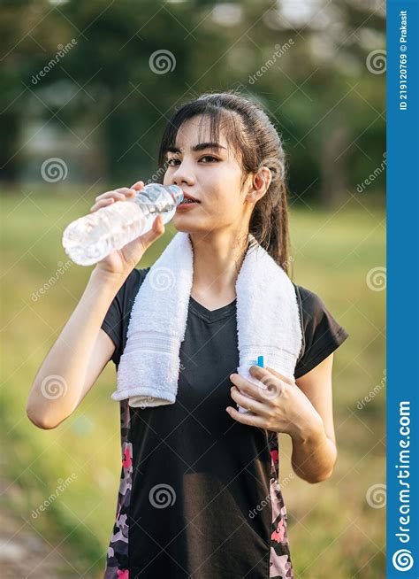 Women Stand To Drink Water After Exercise Stock Image Image Of