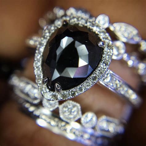The halo is a dazzling feature that exhibits a center stone held in a luminous circle of smaller the stones that are most coveted for engagement rings are diamond and blue sapphire. Black Diamond Engagement Rings