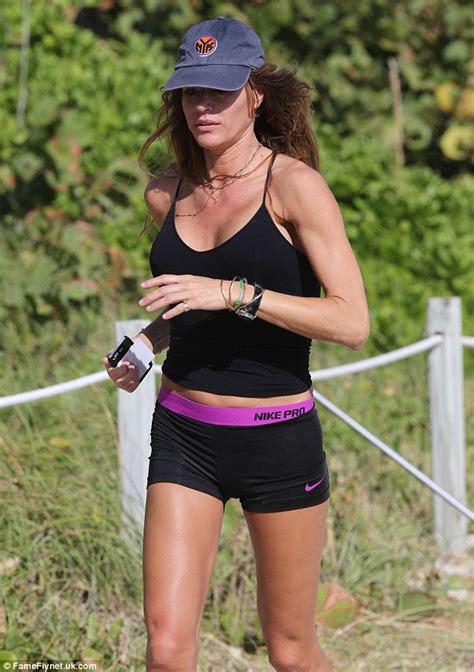Kelly Bensimon 45 Shows Off Her Muscular Athletic Body In A Tiny White Bikini On Miami Beach