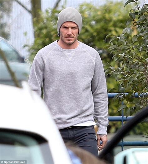 David Beckham Keeps His Locks Hidden Under Grey Beanie Daily Mail Online