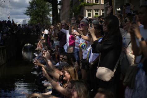 pride on the canal huge crowds at amsterdam water parade