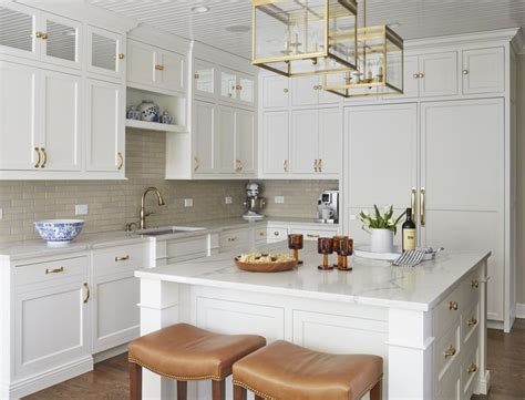 White Kitchen With Brass Accents Design By