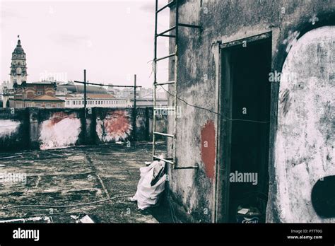 High Tower And Skyline From A Shabby Building Rooftop Stock Photo Alamy