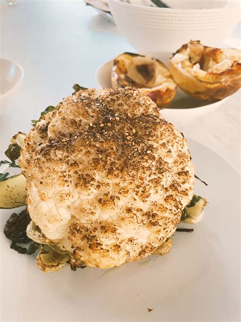 I covered and cooked at 400 for 20 mins, then added bread crumbs and a fair amt. Perfect Whole Roasted Cauliflower Recipe - The Well Necessities