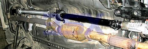 Universal joint shaft (left) are longer and connects from the front of the car to the rear; PST Aluminum/Steel Hybrid Drive Shaft 2-piece Driveshafts ...