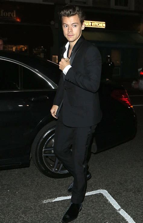 For his appearance on harry styles at the bbc, harry killed it in a floral suit. Harry Styles Wears Saint Laurent Suit And Boots at Another ...