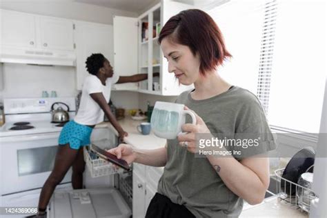 Black Couple Washing Dishes Photos And Premium High Res Pictures Getty Images