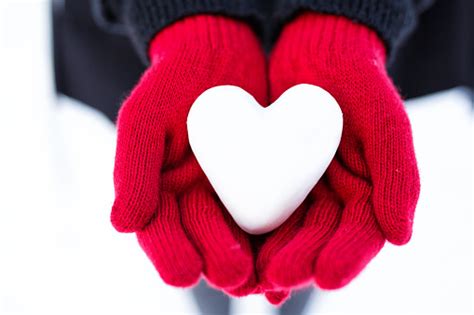 Woman Hands Holding Snow Heart Stock Photo Download Image Now Istock