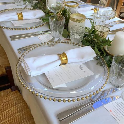 Not only do they anchor the dining table, create ambiance, and are aesthetically pleasing to guests, chargers also protect the table and tablecloth from becoming dirty during service. Gold Beaded Charger Plates - Harbourside Decorators