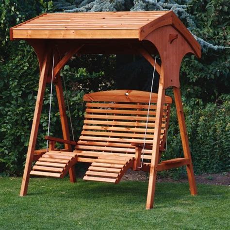 Swing seat outdoor wooden rocking set heavy garden summer. Garden swings are making a difference in the modern ...