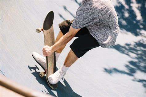 Free Photo Man Taking Skateboard